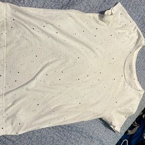 White poka dot shirt